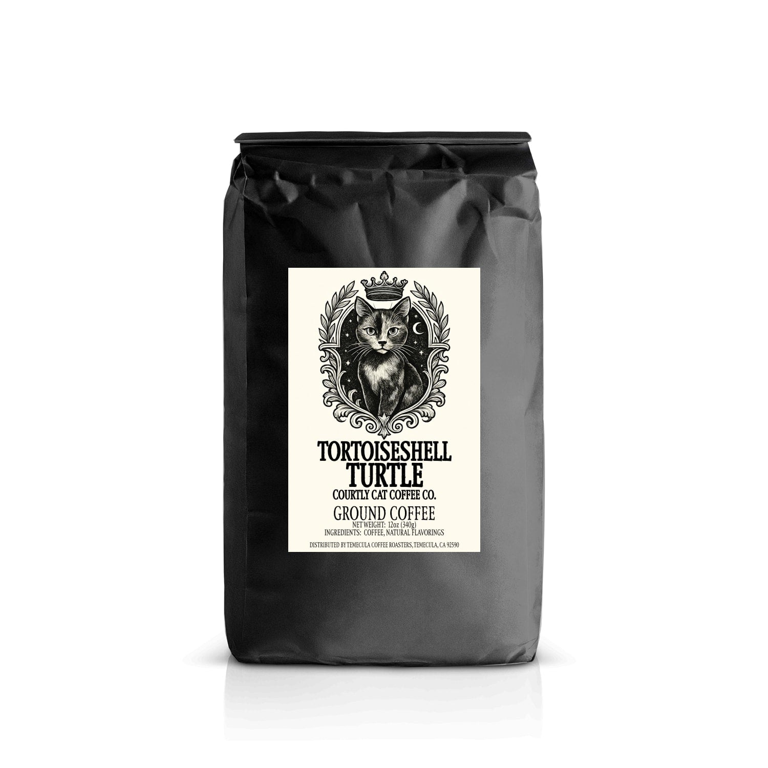 Sophisticated black coffee bag with a label featuring an illustration of a tortoiseshell breed cat with a crown in a celestial royal crest and text on a white background.